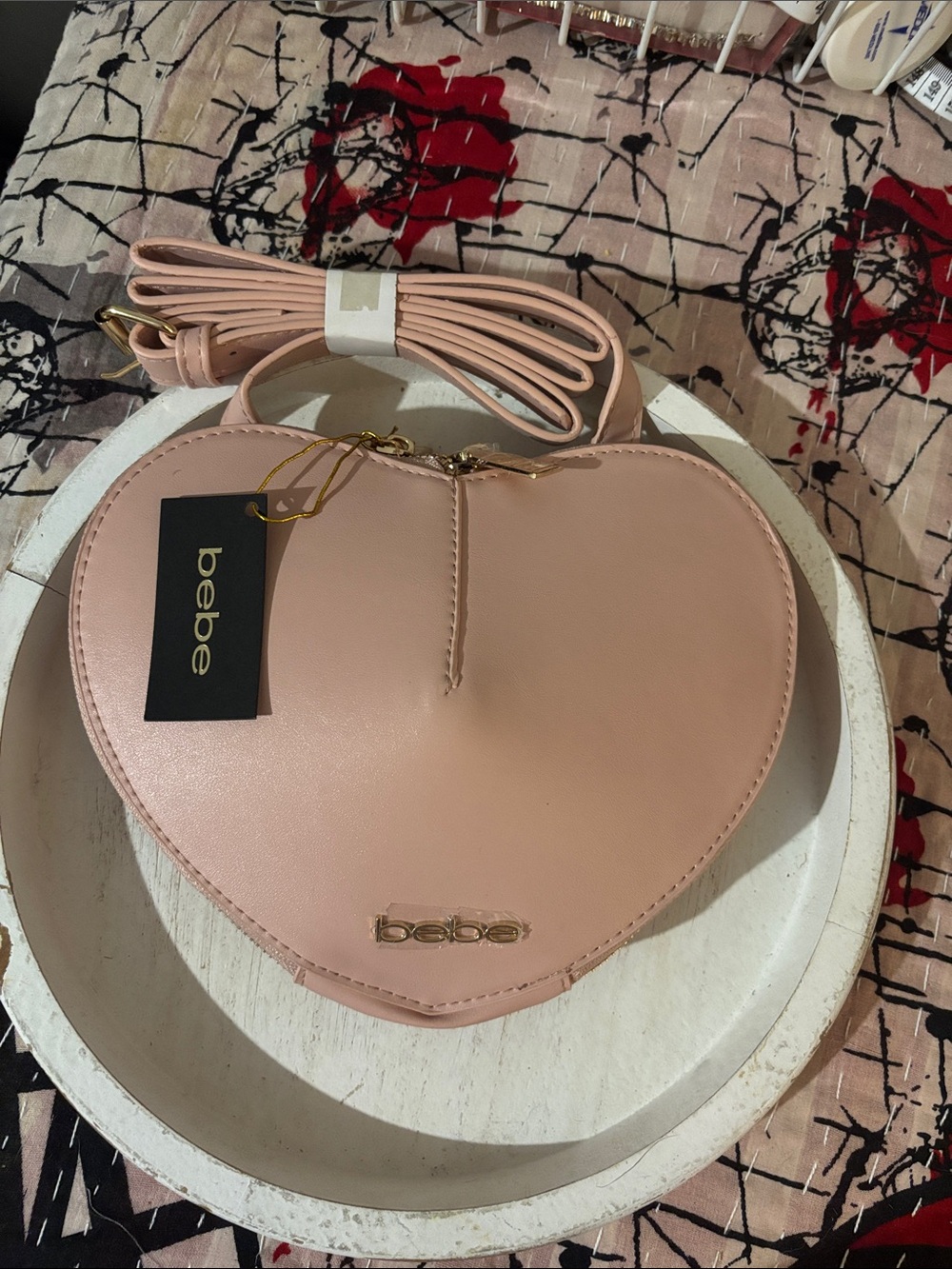 bebe Heart-Shaped Crossbody Bag in Pale Pink
